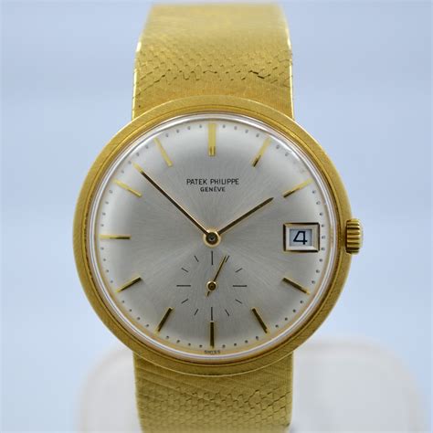 vintage patek philippe 18k yellow gold bezel watch 33mm|gold Patek Philippe for sale.